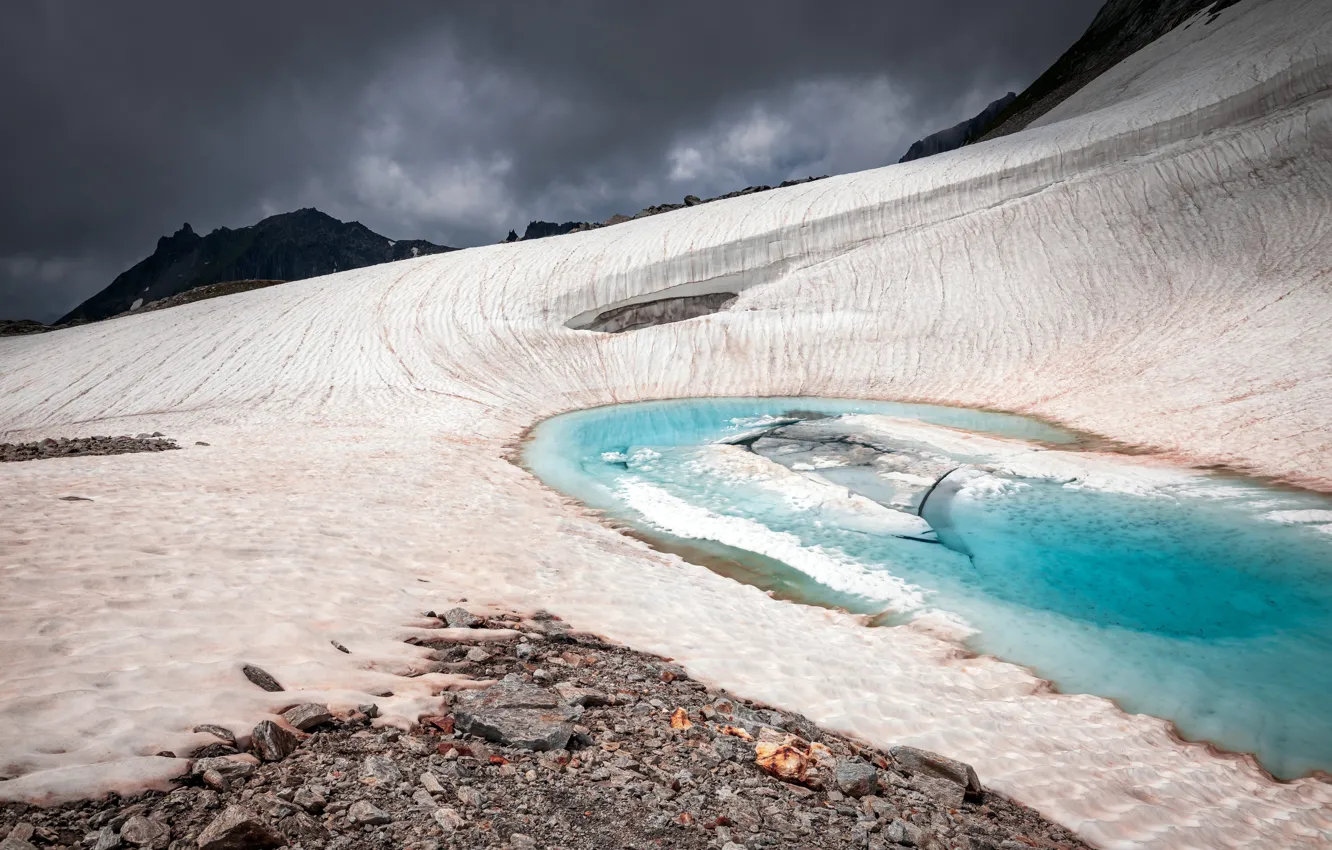 Photo wallpaper mountains, lake, stones, rocks, shore, slope, blue water