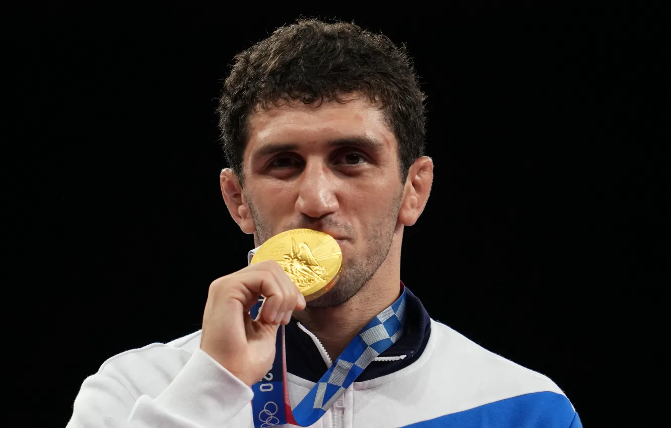 Photo wallpaper gold medal, pedestal, Olympic champion, wrestling, Zaurbek Sidakov