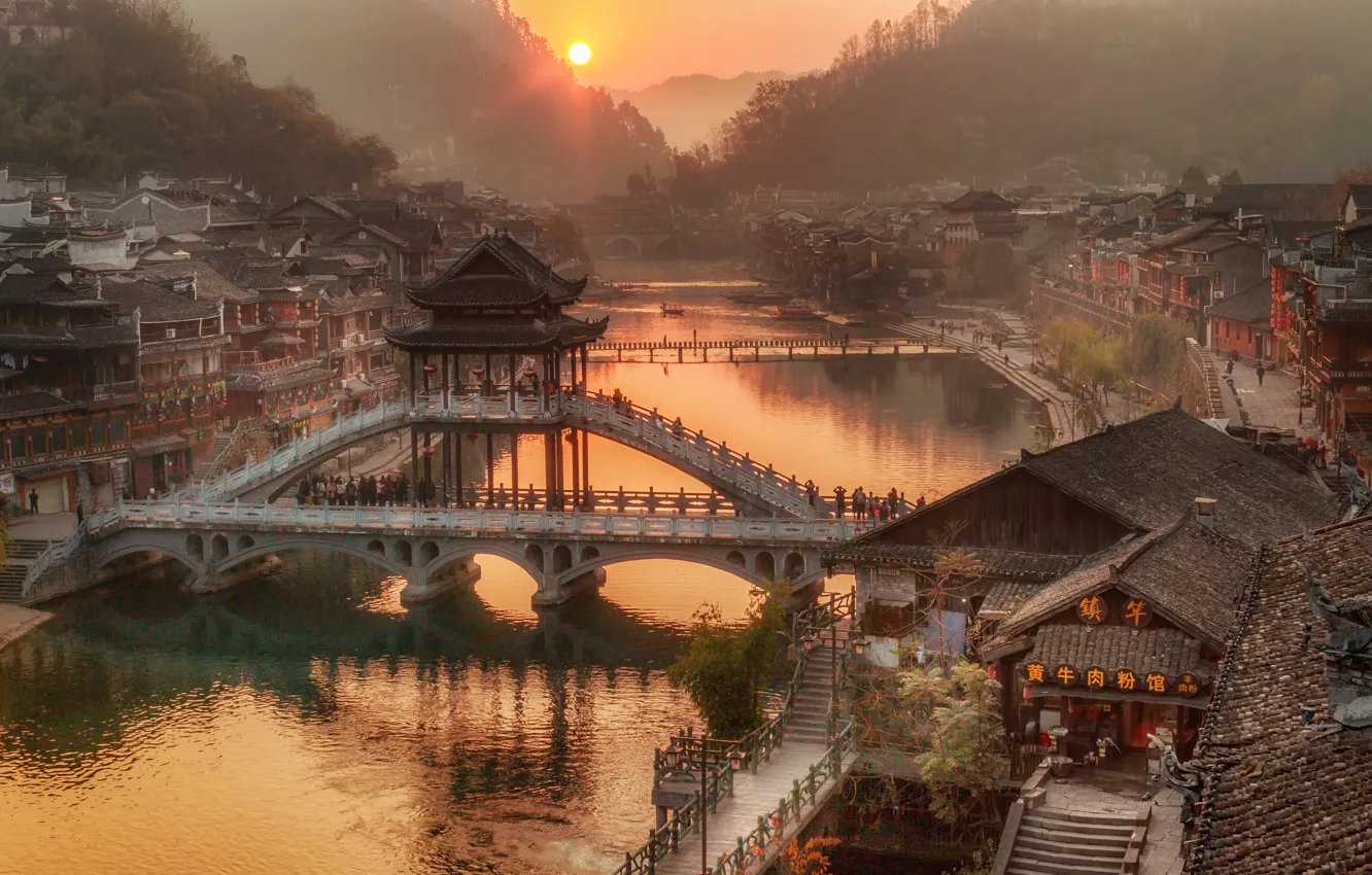 Photo wallpaper forest, the sun, trees, mountains, bridge, fog, river, dawn