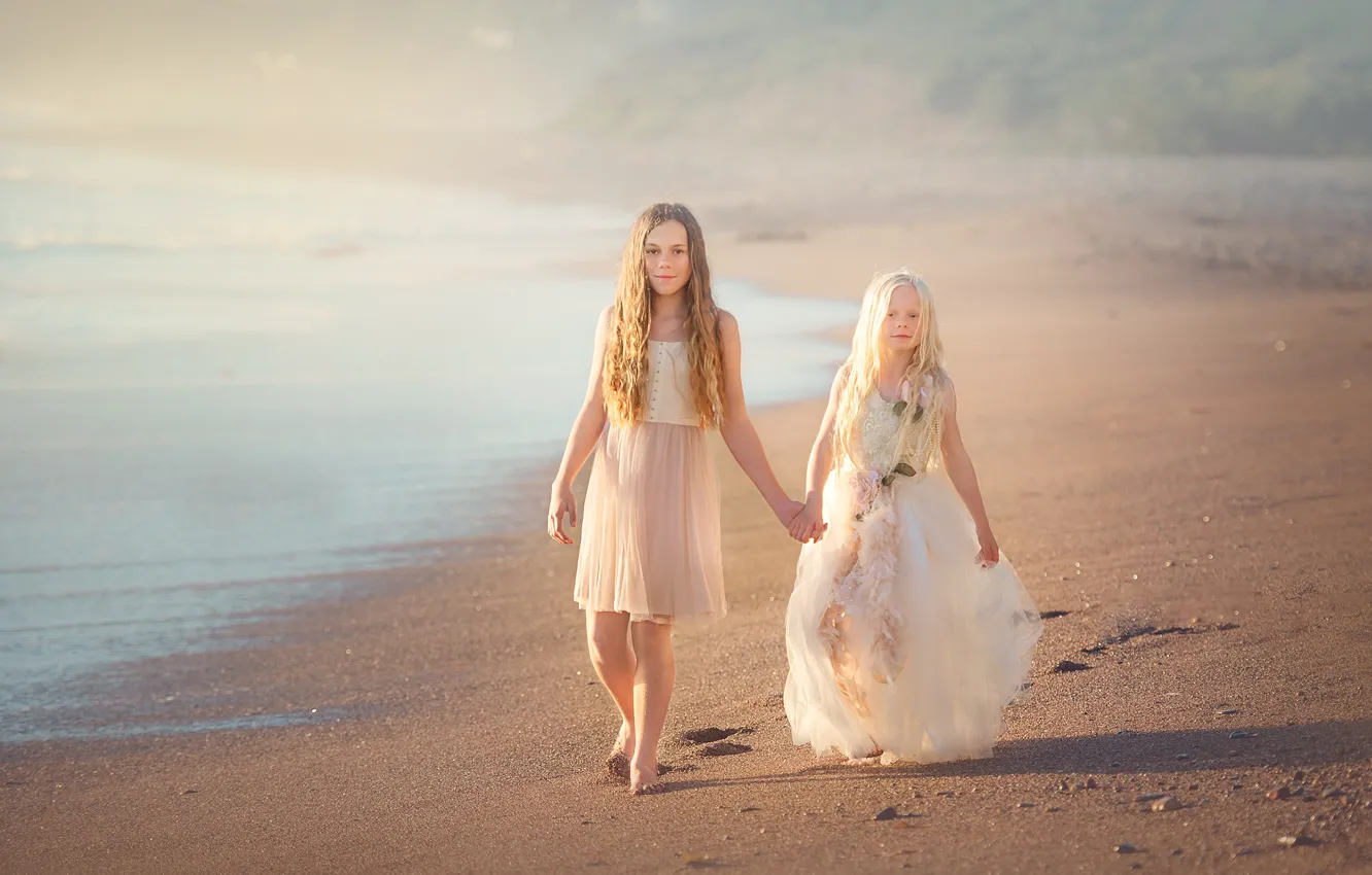 Photo wallpaper sand, shore, dresses, two girls