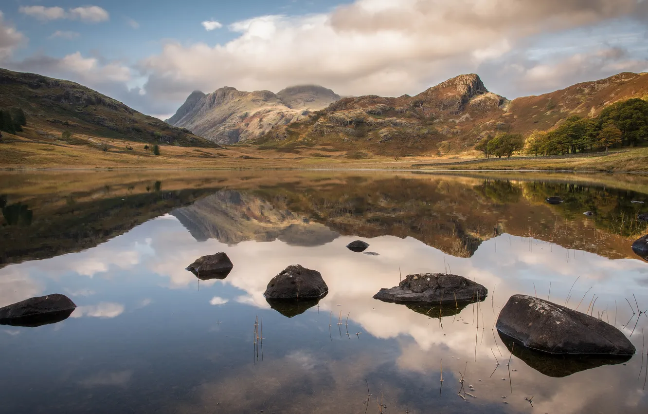 Photo wallpaper clouds, mountains, lake, reflection, stones, shore