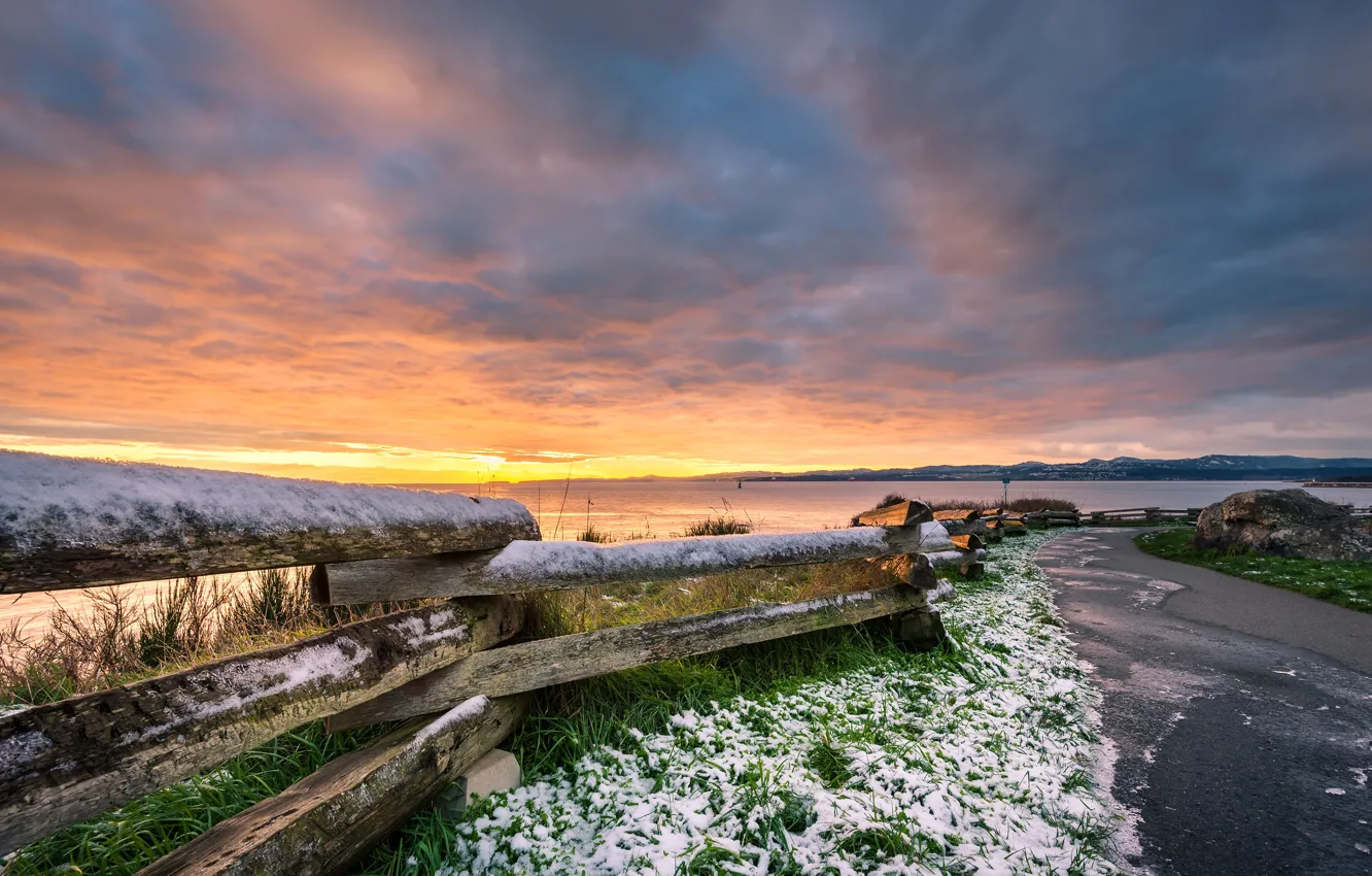 Photo wallpaper road, sea, the sky, grass, snow, clouds, stones, coast