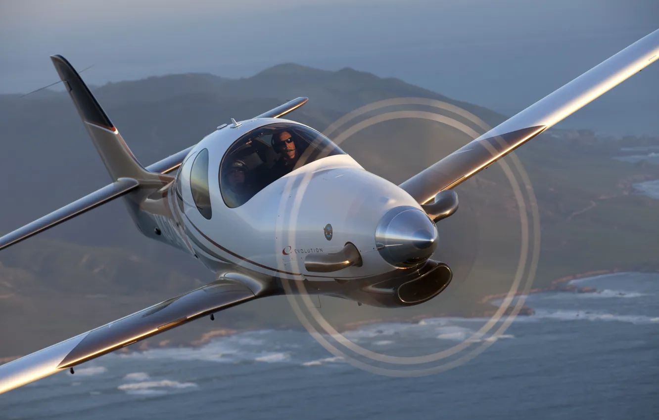Photo wallpaper The plane, Flight, Propeller, Male, Pilot, Evolution EVO-750, Low-wing aircraft, Evolution Aircraft