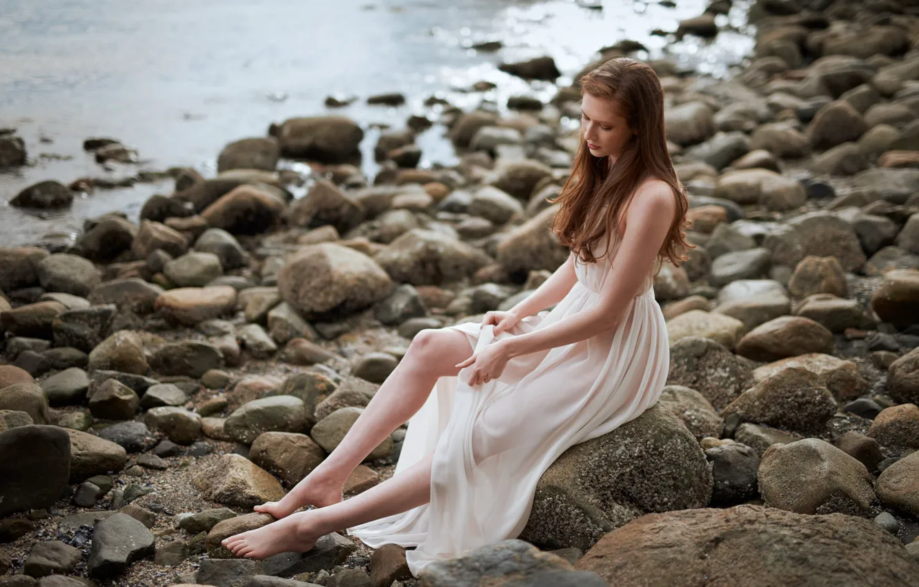 Photo wallpaper sea, girl, nature, pose, stones, shore, hair, dress