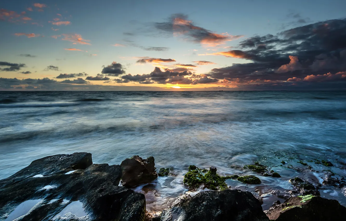 Photo wallpaper sea, wave, the sun, clouds, stones, horizon