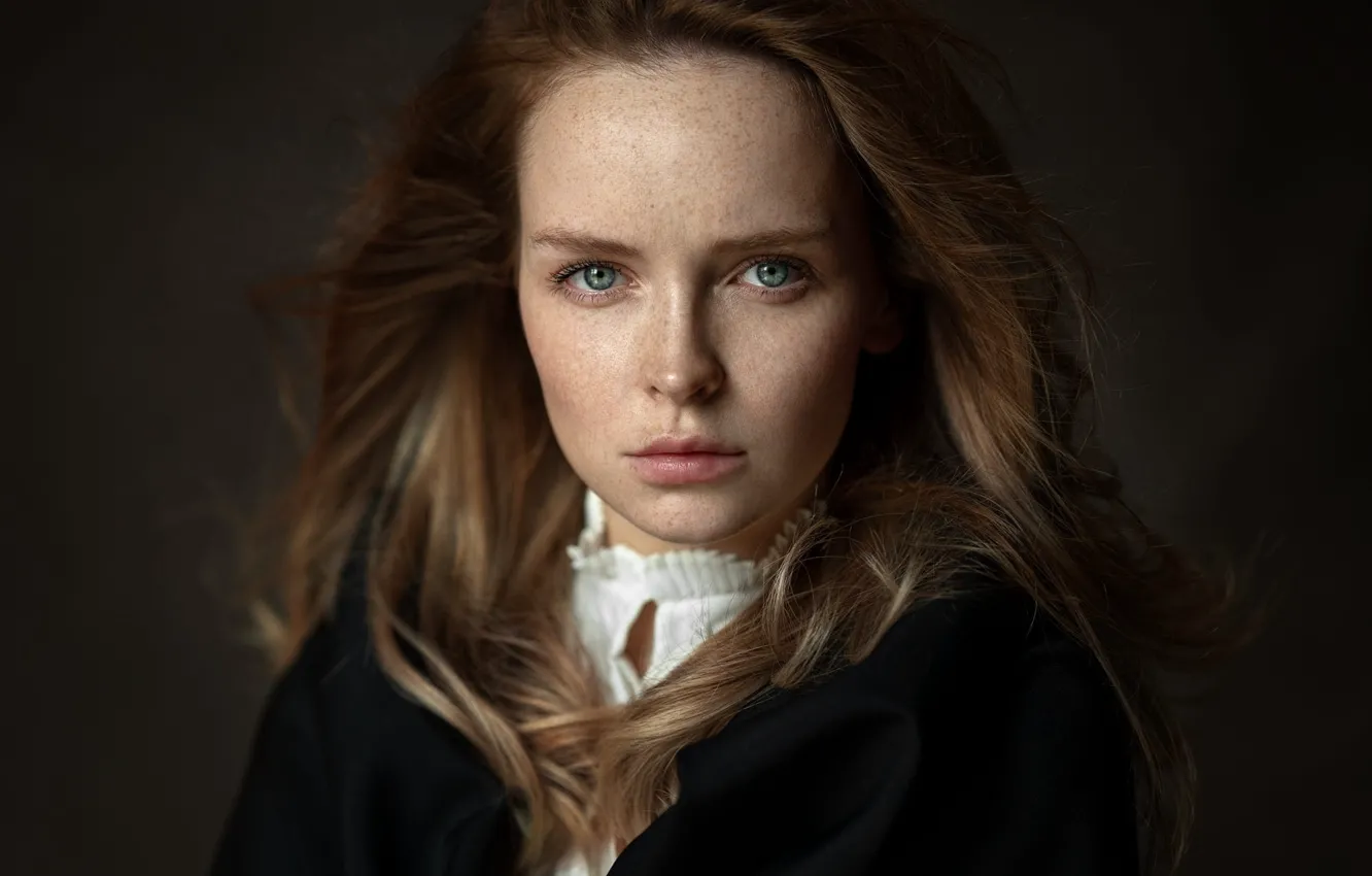 Photo wallpaper look, girl, light, face, the dark background, portrait, freckles, blue eyes