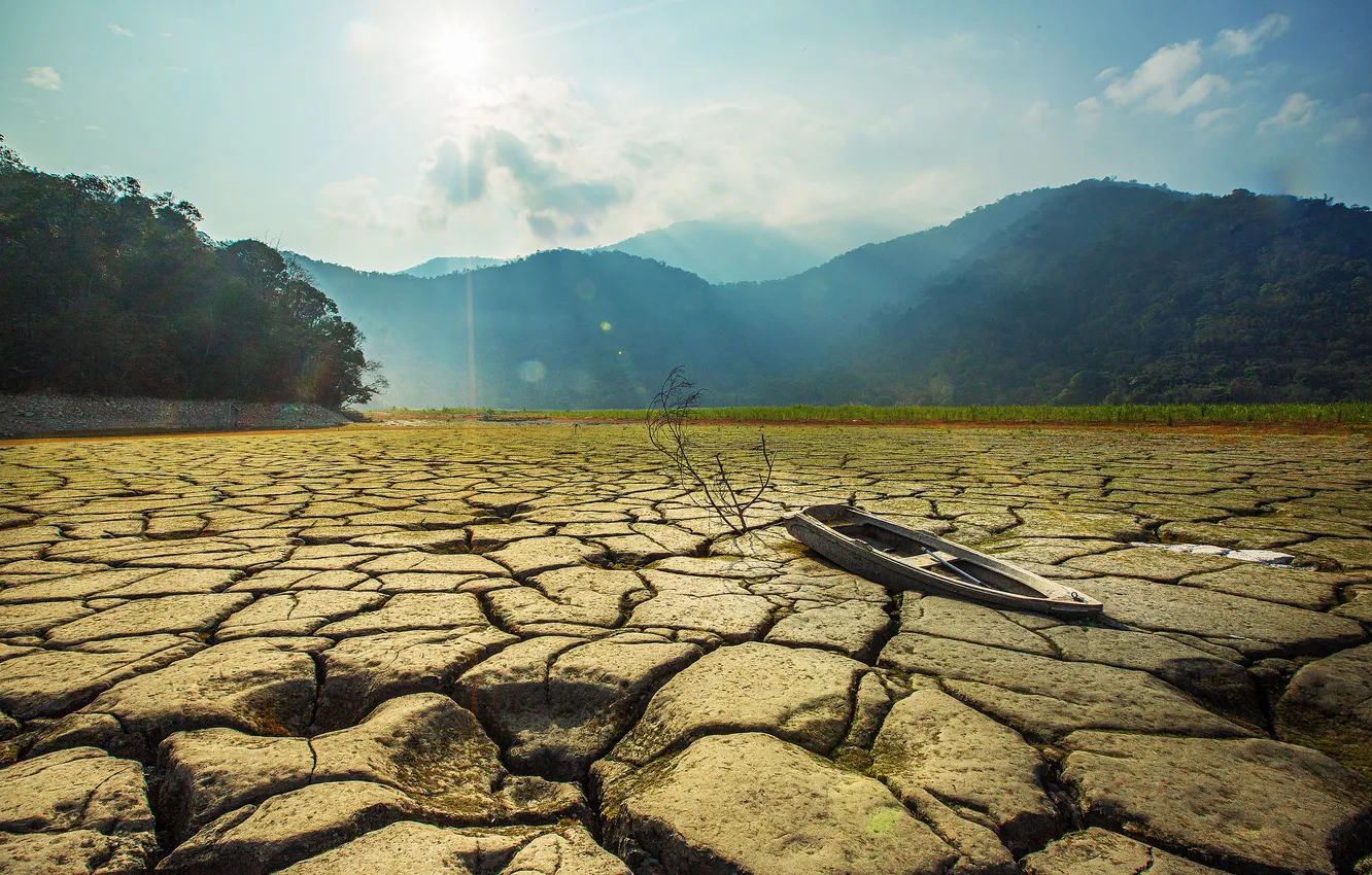 Photo wallpaper field, the sky, the sun, clouds, rays, mountains, cracked, desert