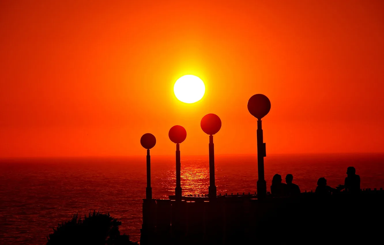 Photo wallpaper sea, the sun, sunset, people, silhouette, lights, glow, Spain