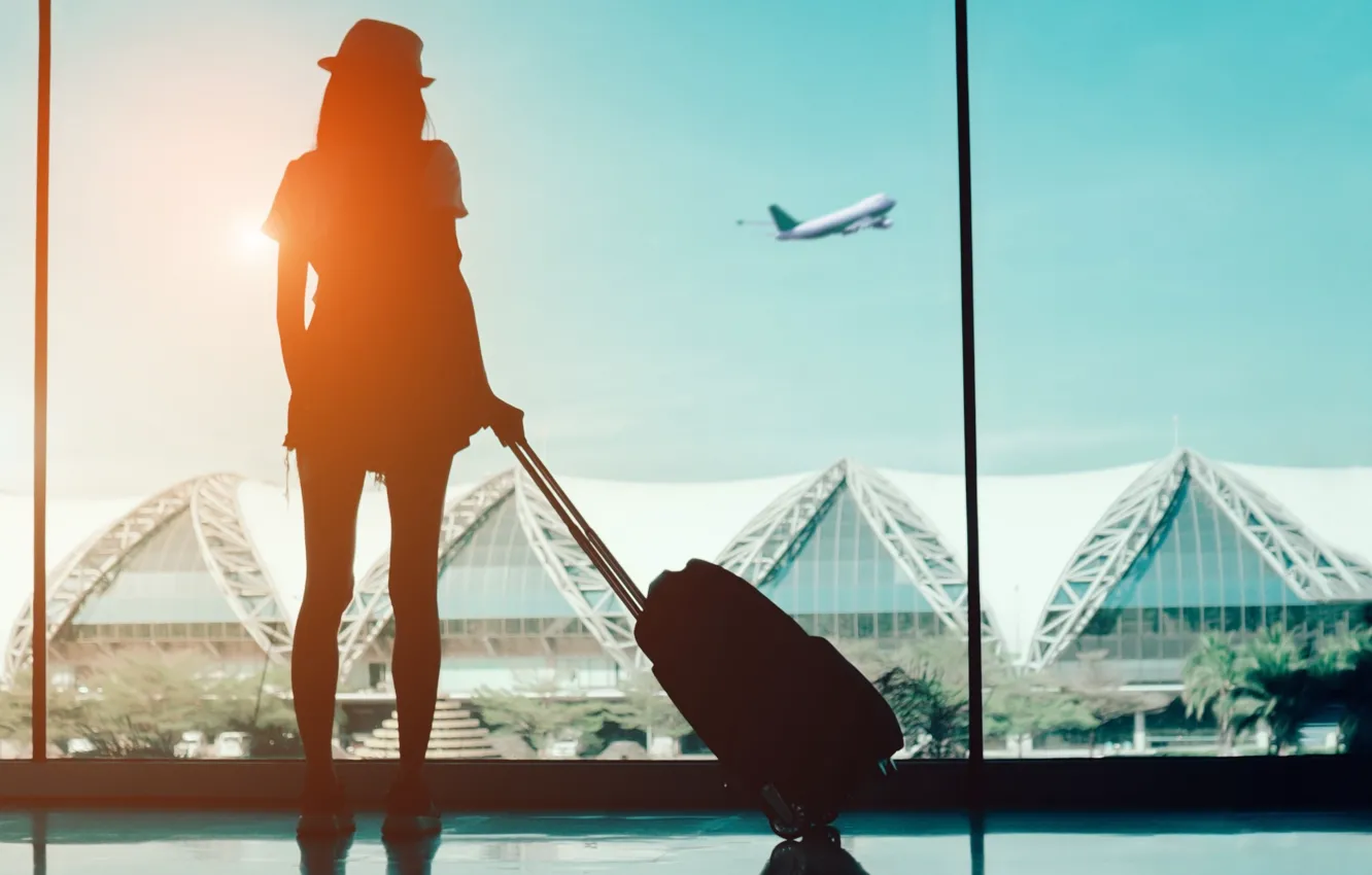Photo wallpaper girl, the plane, airport, suitcase