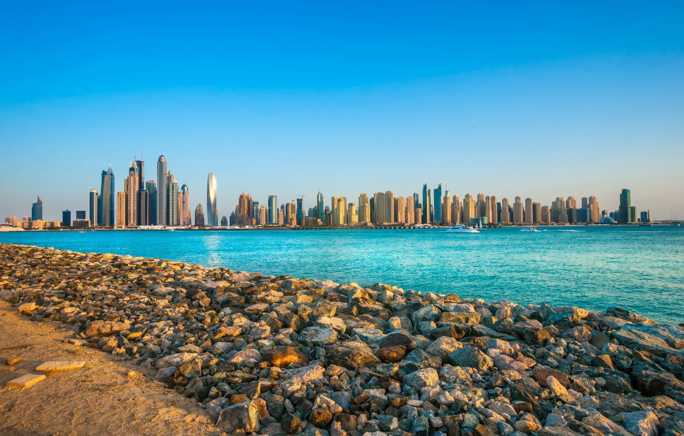Photo wallpaper sand, the sky, the sun, landscape, stones, coast, home, skyscrapers