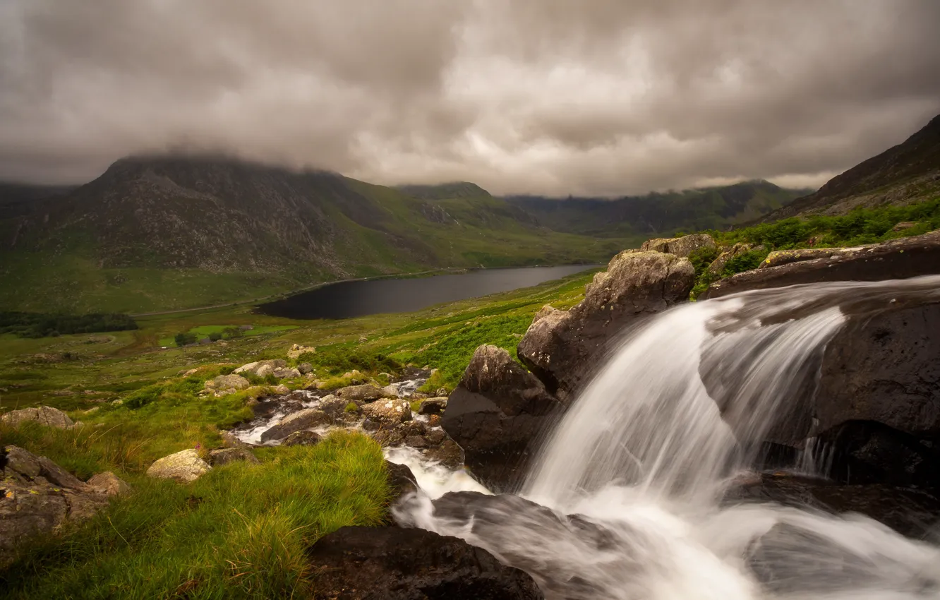 Photo wallpaper grass, clouds, mountains, clouds, fog, lake, stream, stones