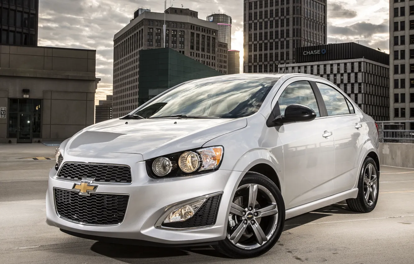 Photo wallpaper the city, lights, Chevrolet, Sonic, before, sedan, Chevrolet, drives