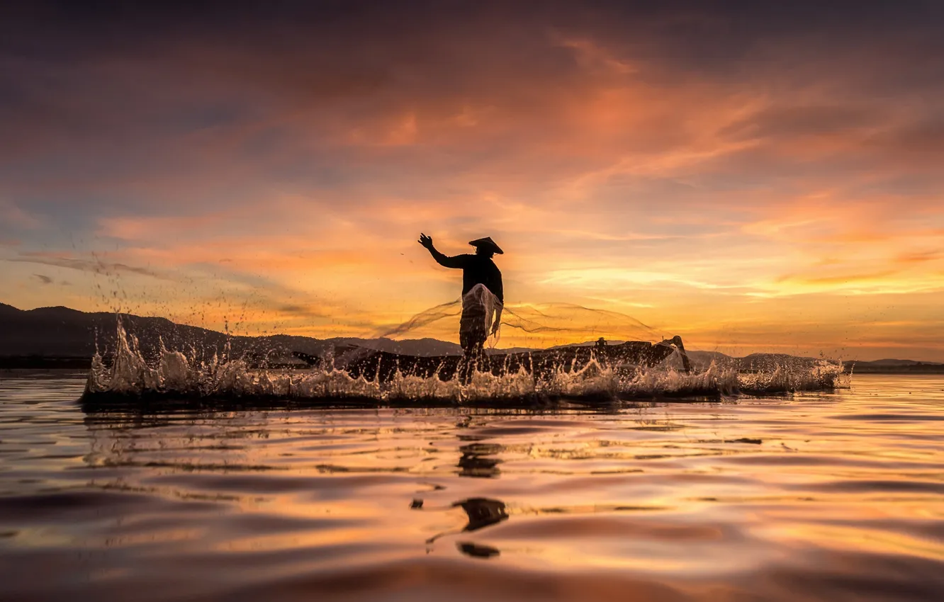 Photo wallpaper sunset, lake, reflection, hills, splash, fisherman, hat, mirror