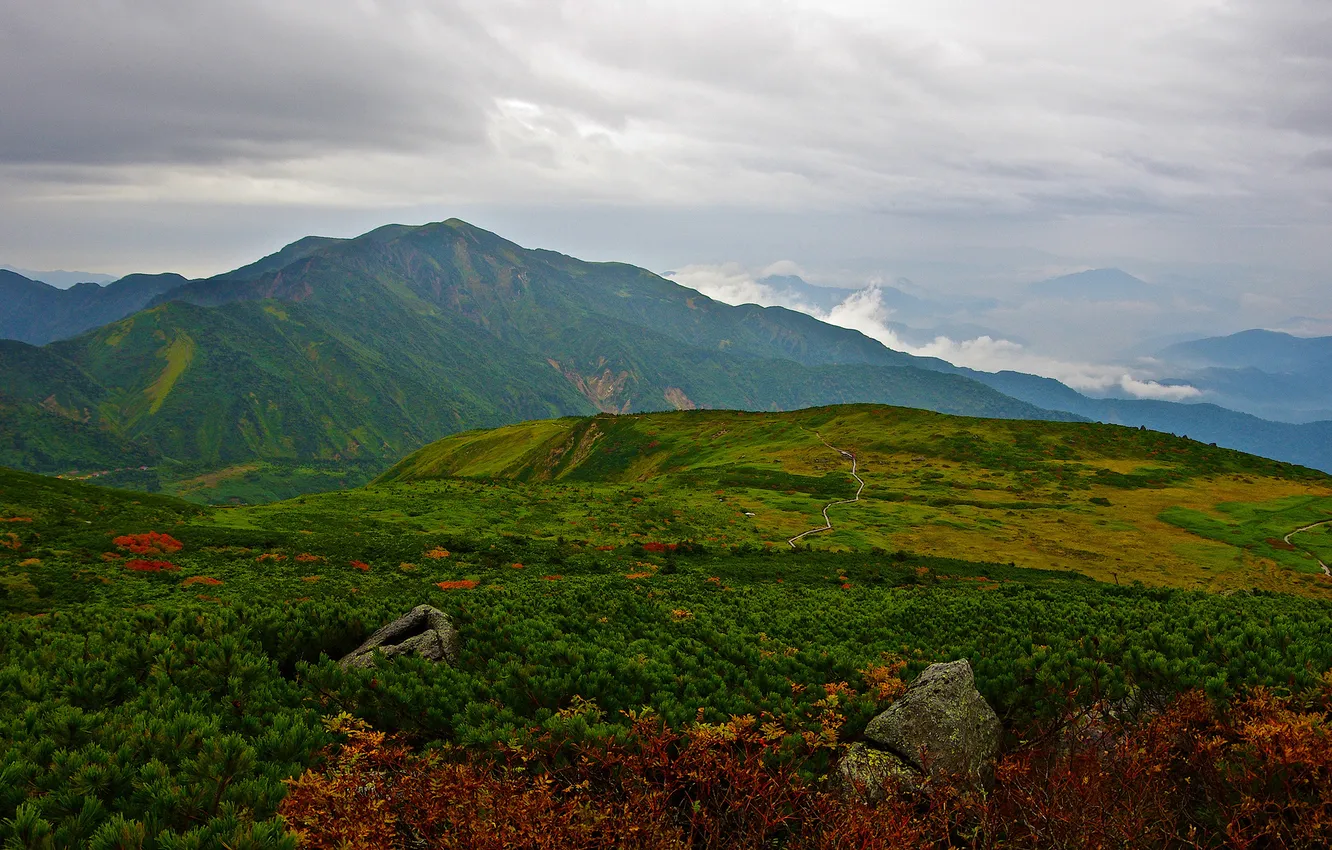 Photo wallpaper clouds, mountains, clouds, stones, vegetation