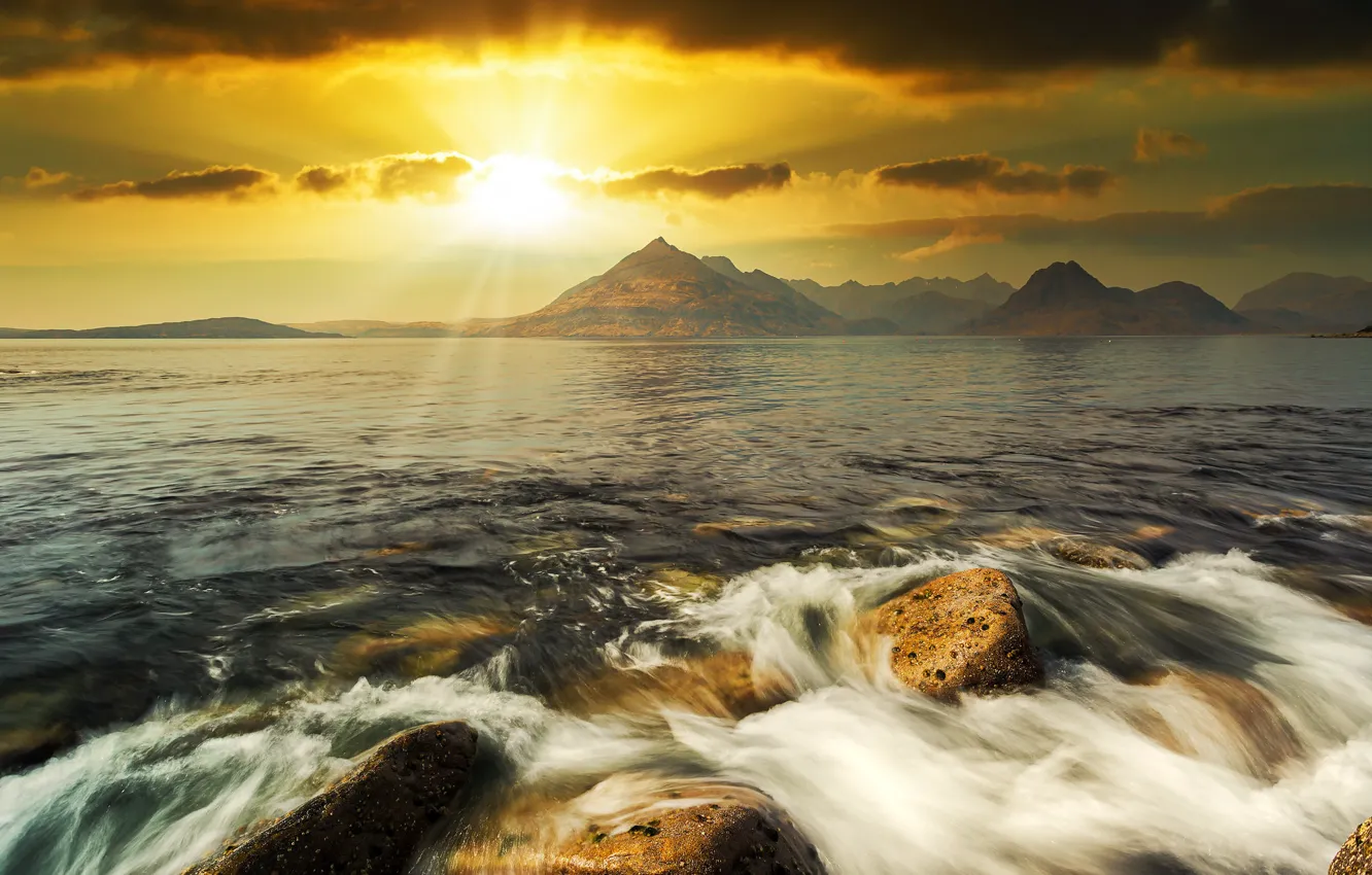 Photo wallpaper sea, wave, the sun, clouds, light, mountains, stones, surf