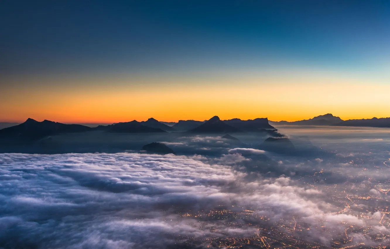 Photo wallpaper clouds, sunset, mountains, the city, view, height