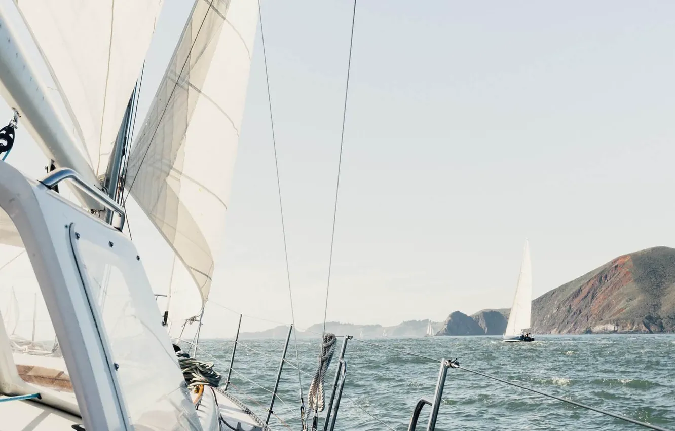 Photo wallpaper sea, wave, rocks, coast, yacht, sail, Thom Milkovic yacht cruising lifestyle