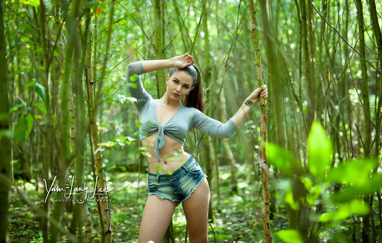 Photo wallpaper greens, forest, leaves, trees, model, shorts, makeup, figure