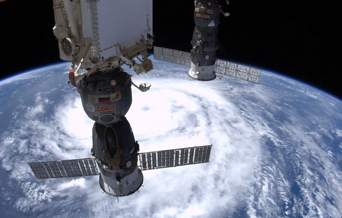 Photo wallpaper space, storm, Earth, ISS, clouds, planet, home, Soyuz