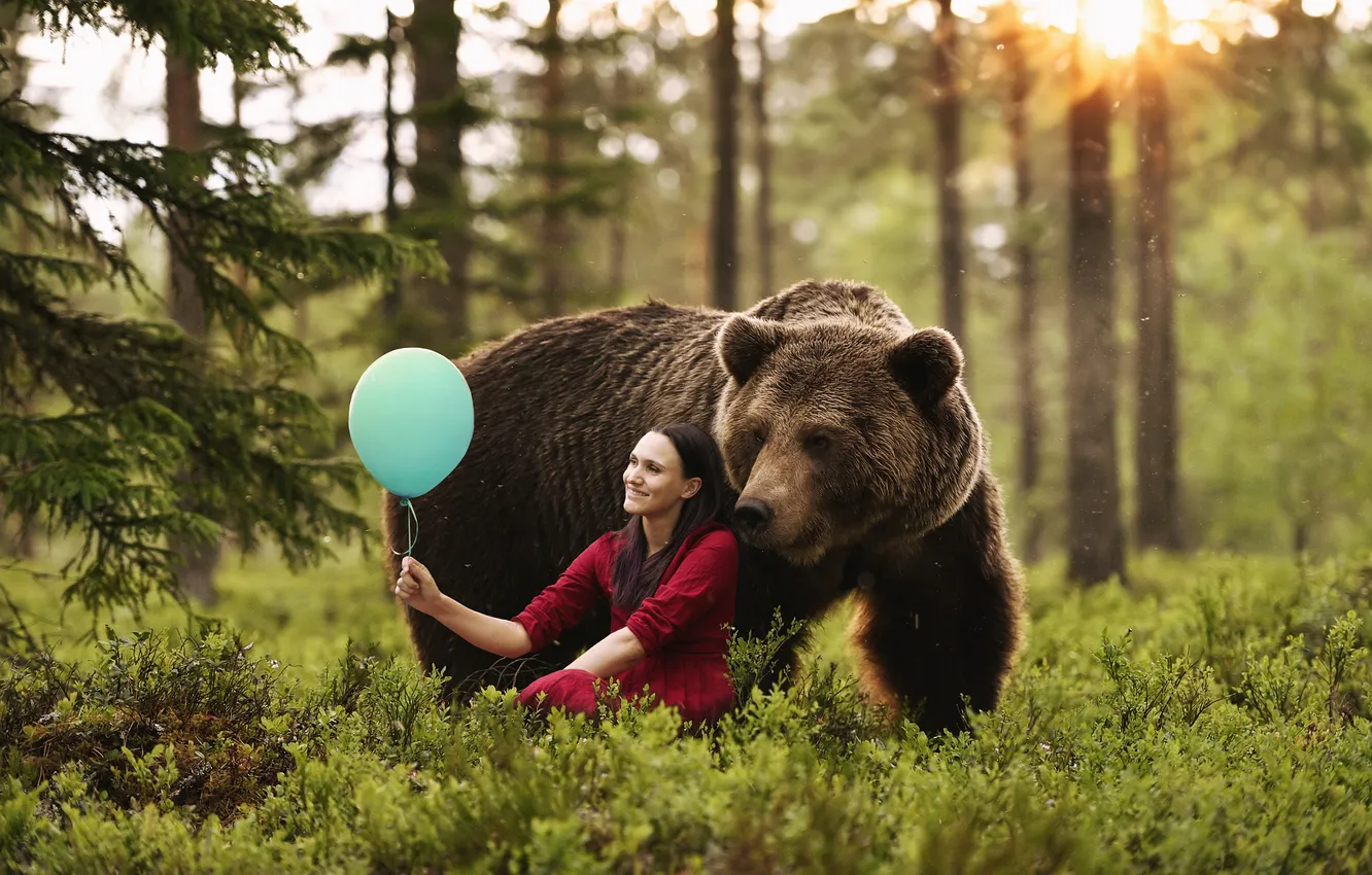 Photo wallpaper forest, look, girl, the sun, branches, nature, pose, smile