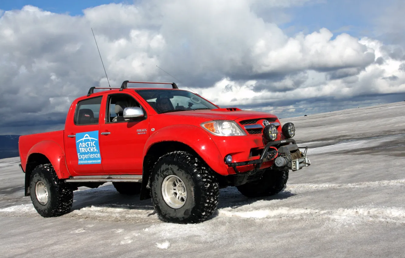 Photo wallpaper the sky, clouds, snow, red, jeep, SUV, Arctic Trucks Toyota Hilux