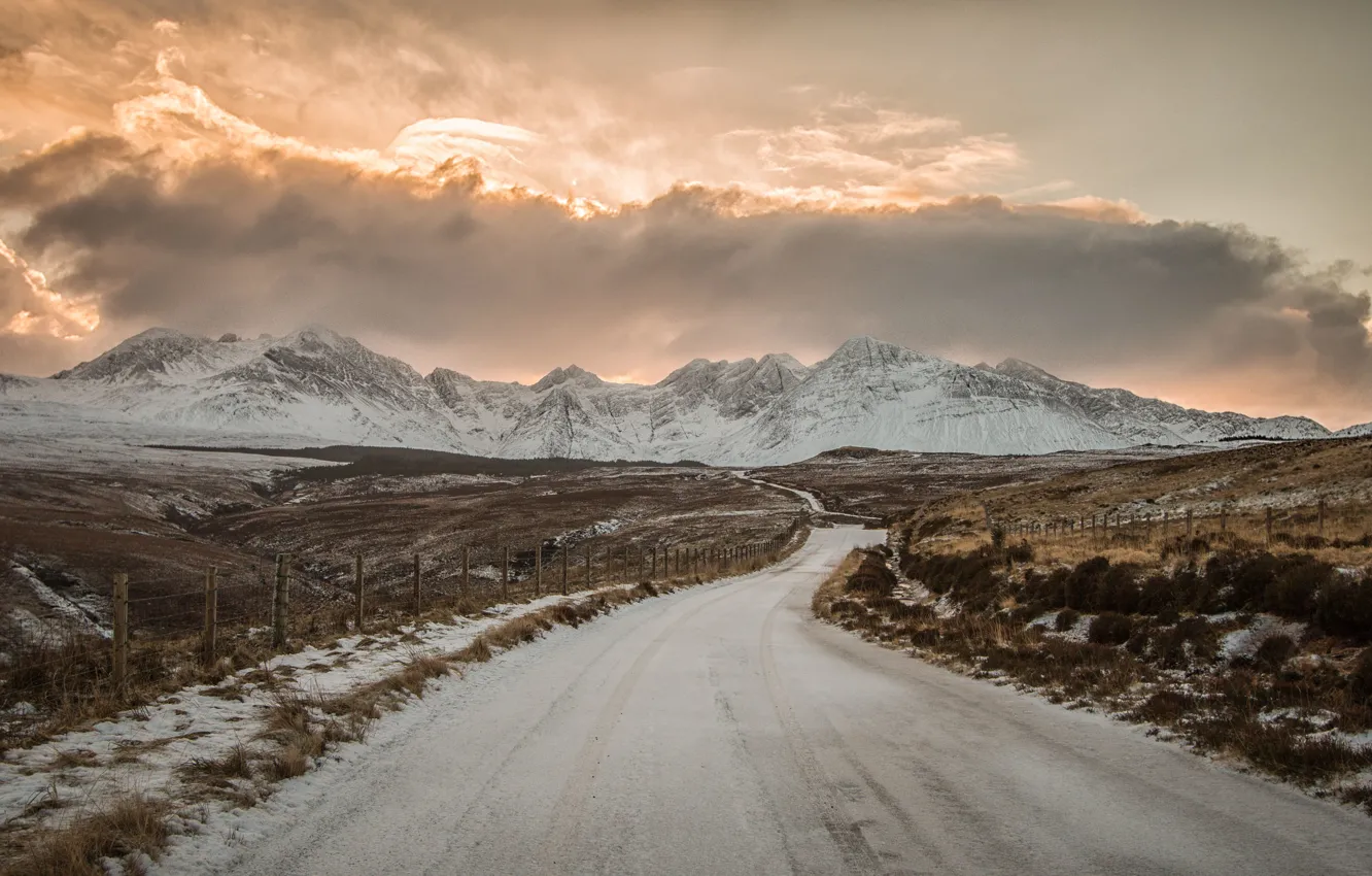 Photo wallpaper winter, road, field, the sky, the sun, clouds, snow, mountains
