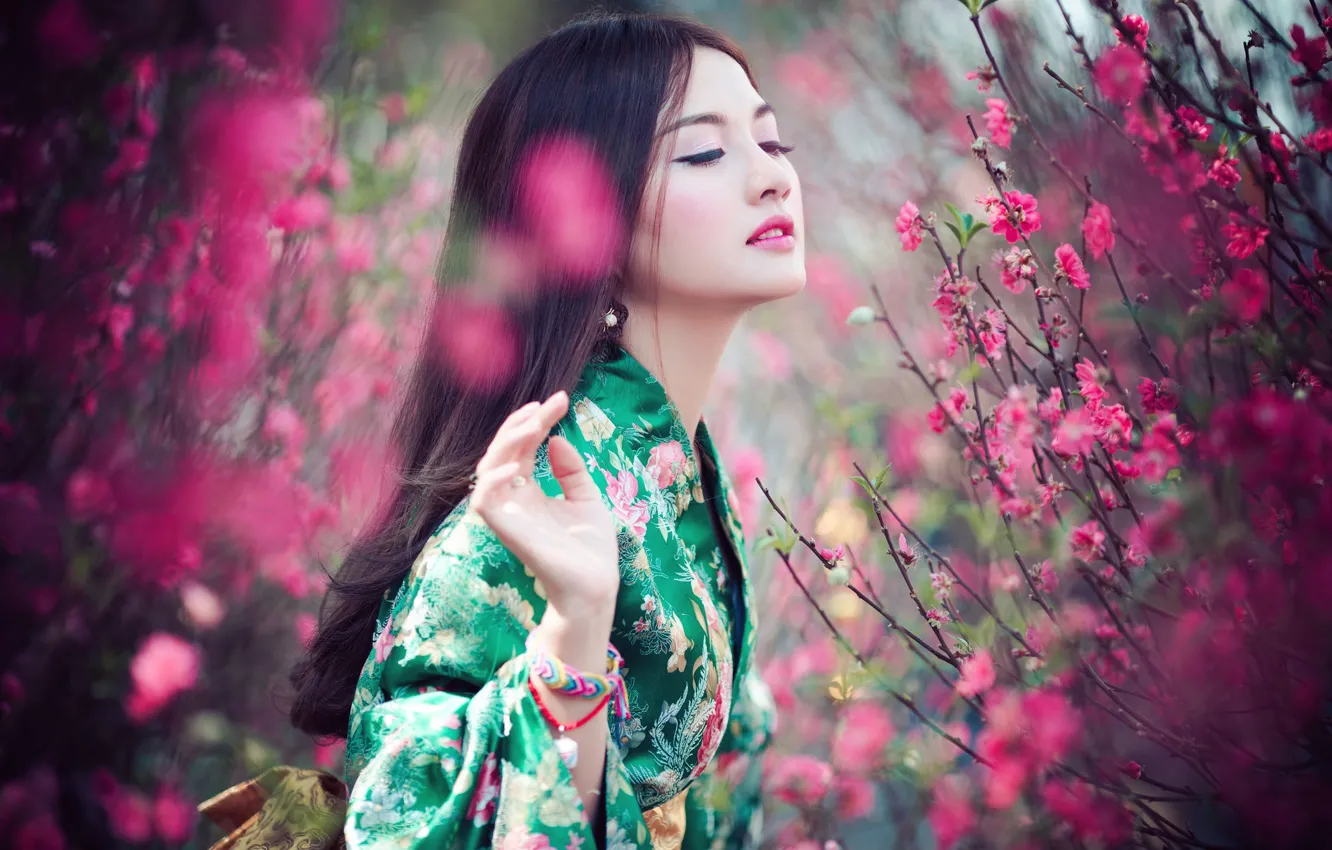 Photo wallpaper look, girl, flowers, branches, nature, pose, green, portrait