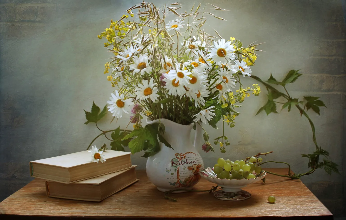 Photo wallpaper table, wall, books, chamomile, bouquet, grapes, vase, pitcher
