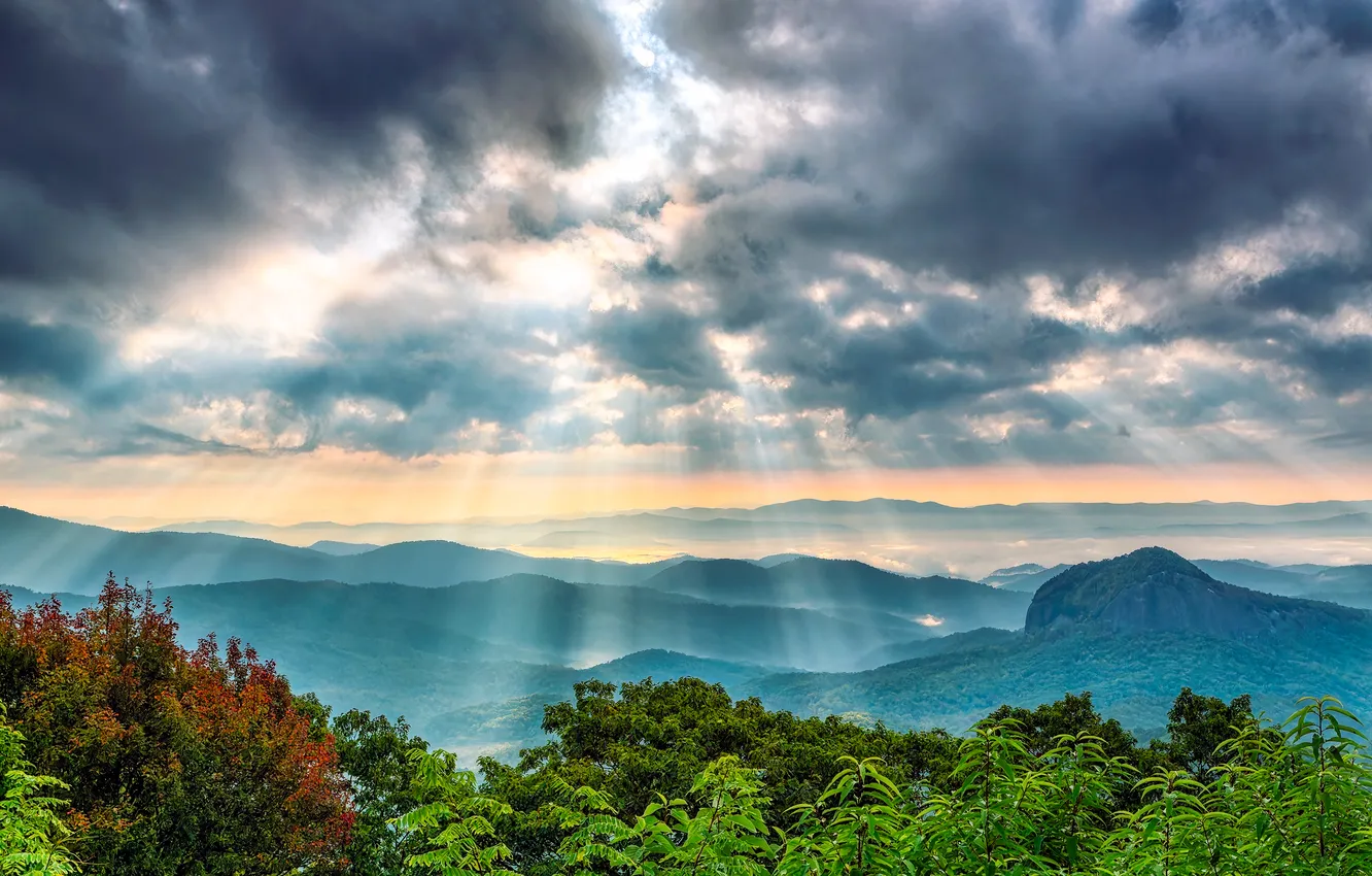 Photo wallpaper the sky, mountains, hills, the rays of the sun