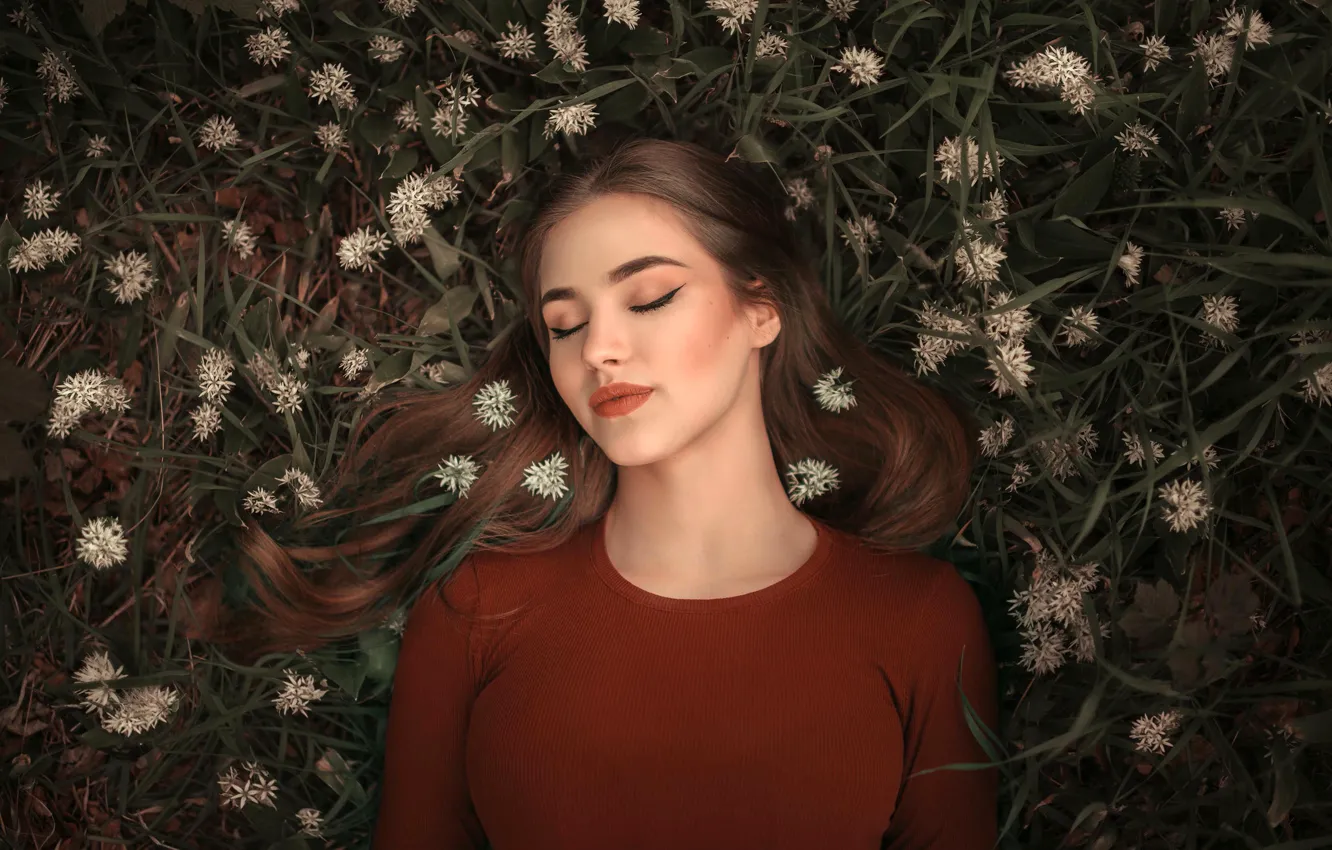 Photo wallpaper grass, flowers, model, portrait, makeup, hairstyle, lies, brown hair