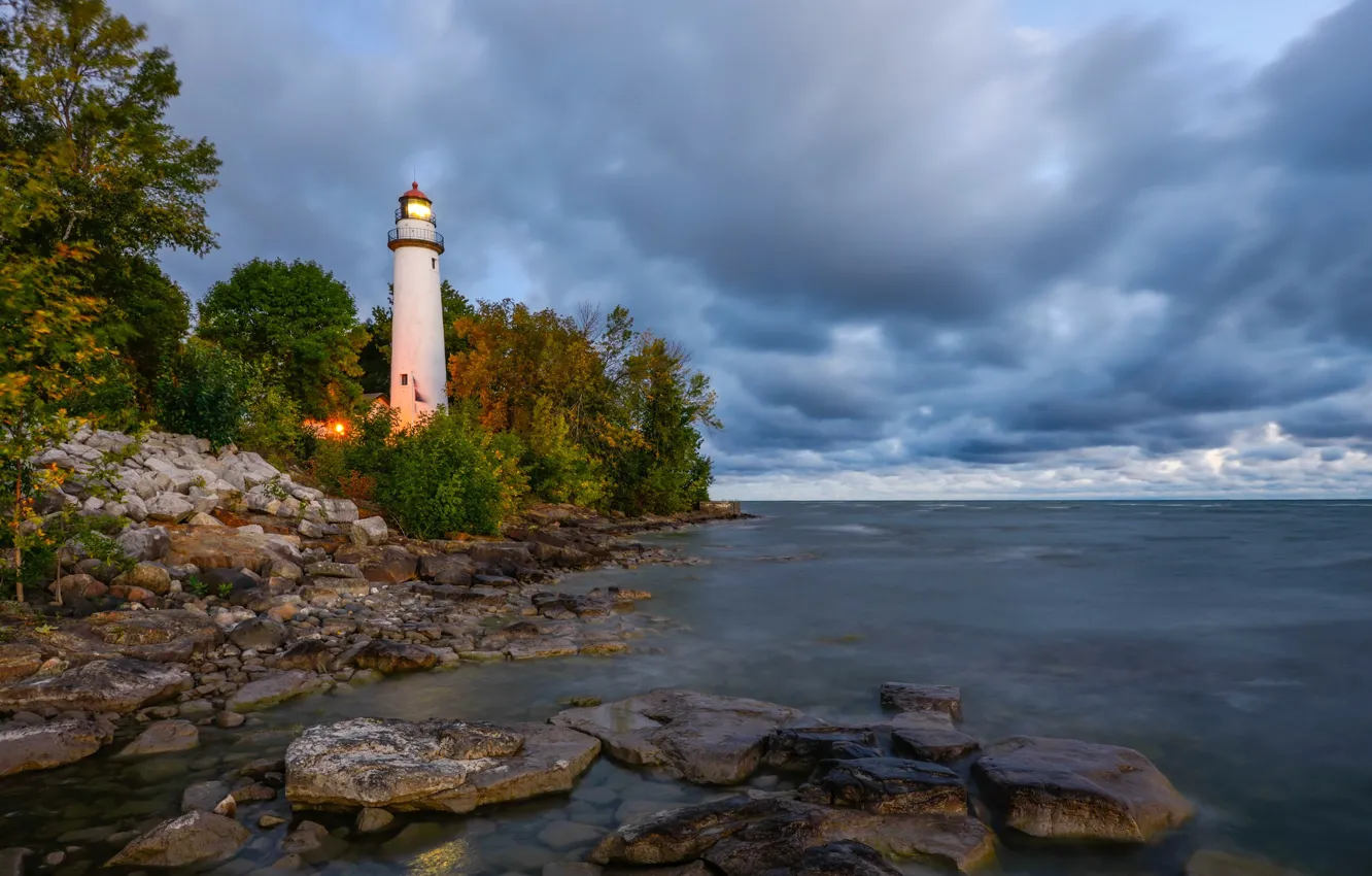 Photo wallpaper sea, the sky, trees, clouds, stones, coast, lighthouse, horizon