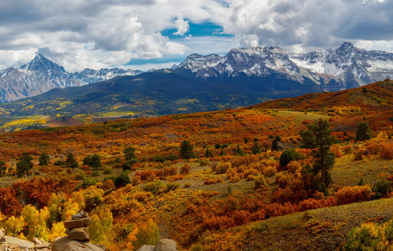 Photo wallpaper field, autumn, forest, clouds, snow, mountains, stones, hills