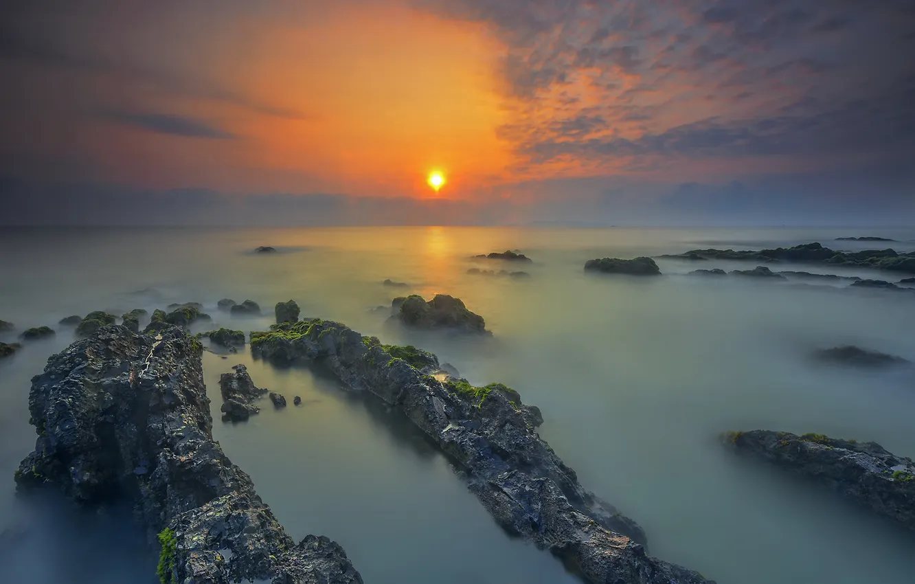 Photo wallpaper sea, the sky, the sun, clouds, sunset, stones, rocks
