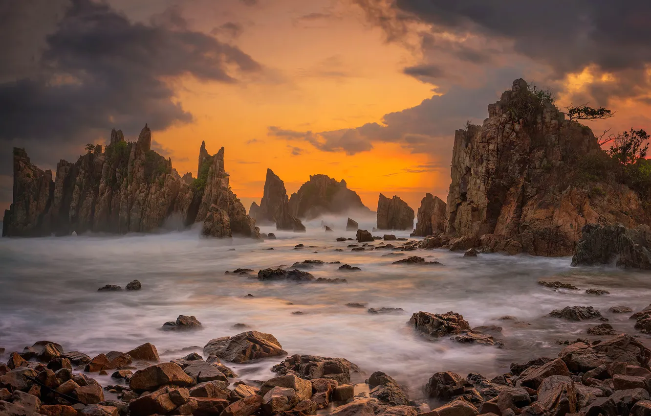 Photo wallpaper sea, clouds, stones, rocks, glow