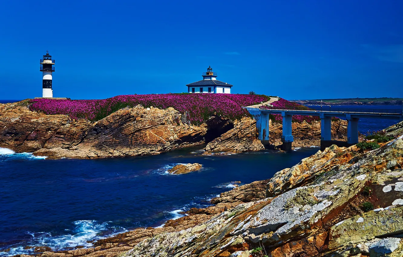 Photo wallpaper sea, bridge, stones, shore, lighthouse, Sunny, Spain, blue sky