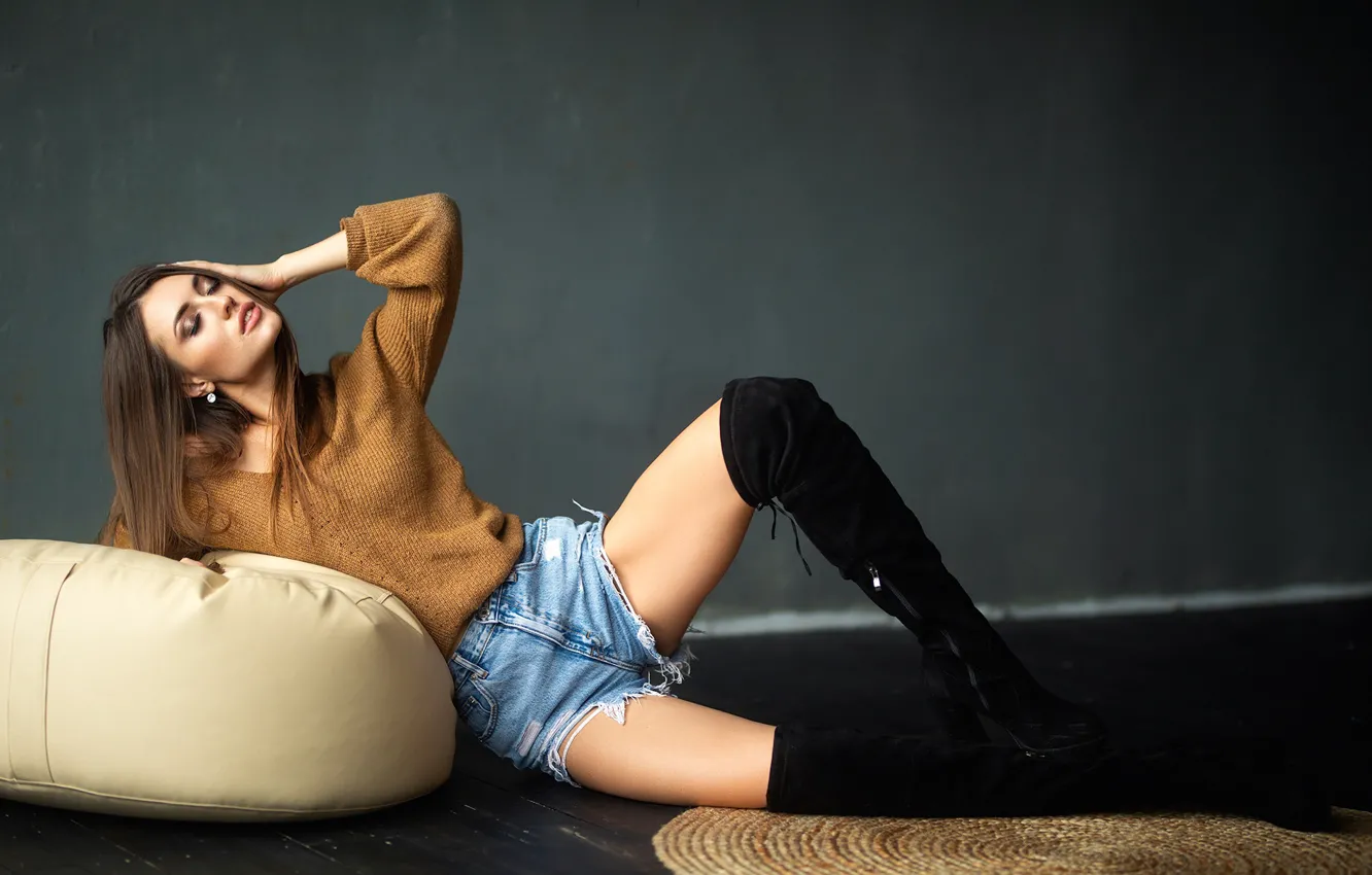 Photo wallpaper girl, pose, feet, shorts, boots, on the floor, sweater, closed eyes