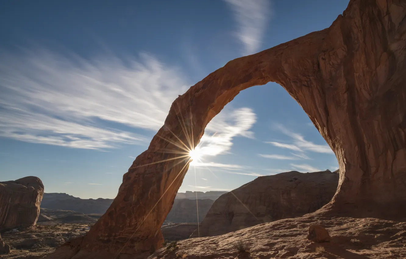 Photo wallpaper the sun, clouds, rays, light, mountains, blue, rocks, desert