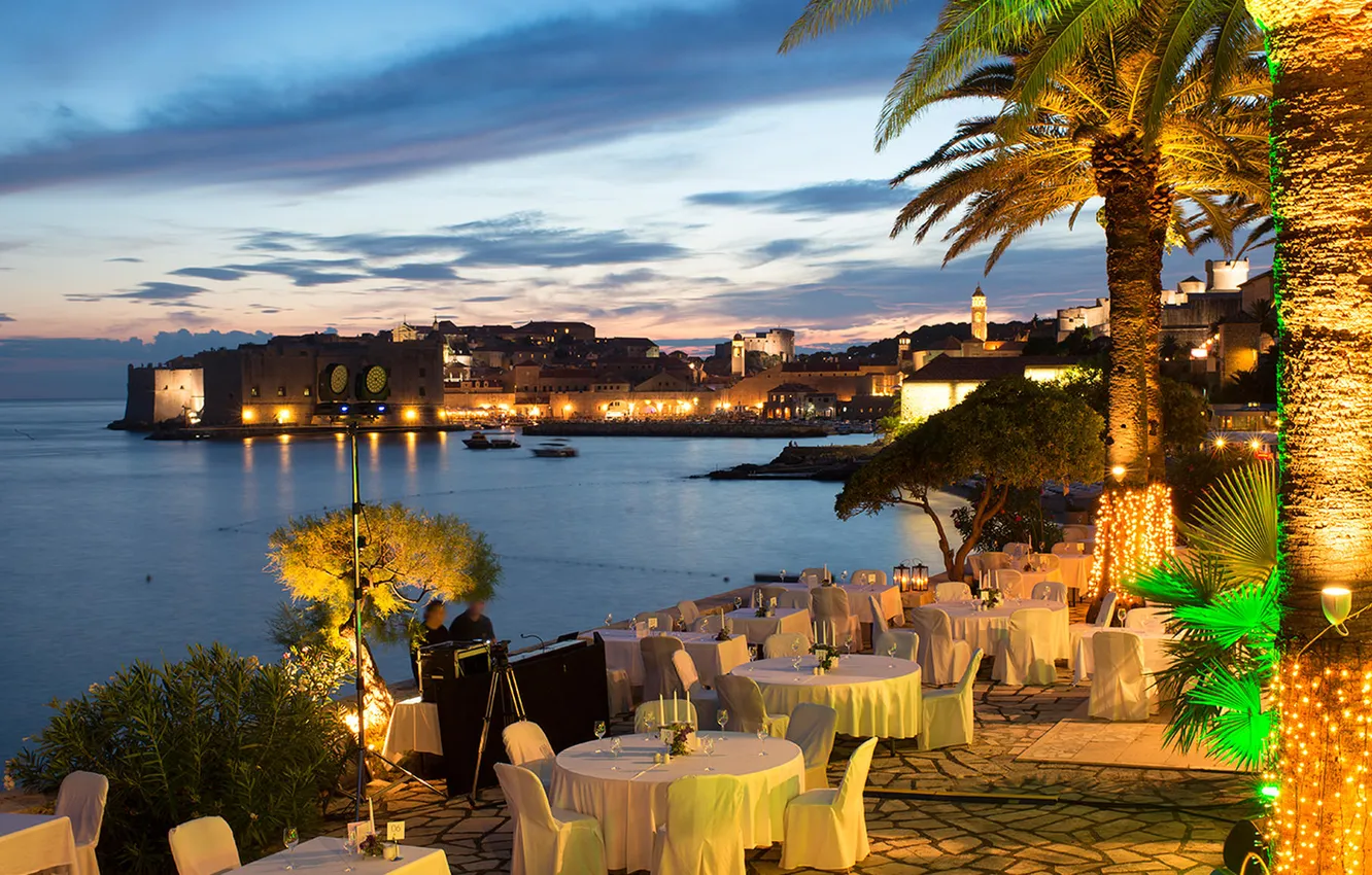 Photo wallpaper sea, the city, lights, the evening, lighting, restaurant, fortress, the hotel