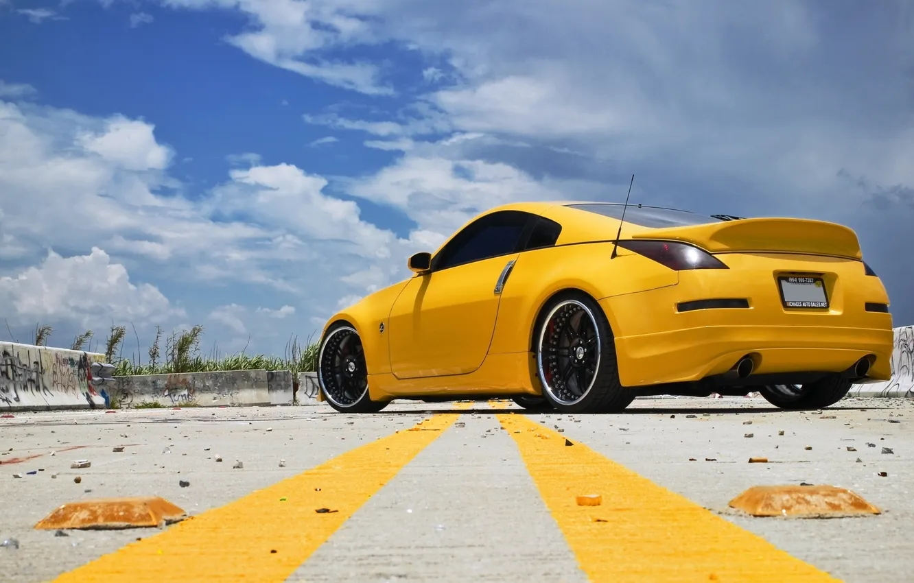 Photo wallpaper the sky, clouds, yellow, strip, coupe, Parking, Nissan, sports car