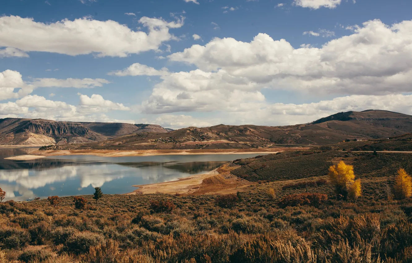 Photo wallpaper the sky, clouds, lake, reflection, hills, village, mirror