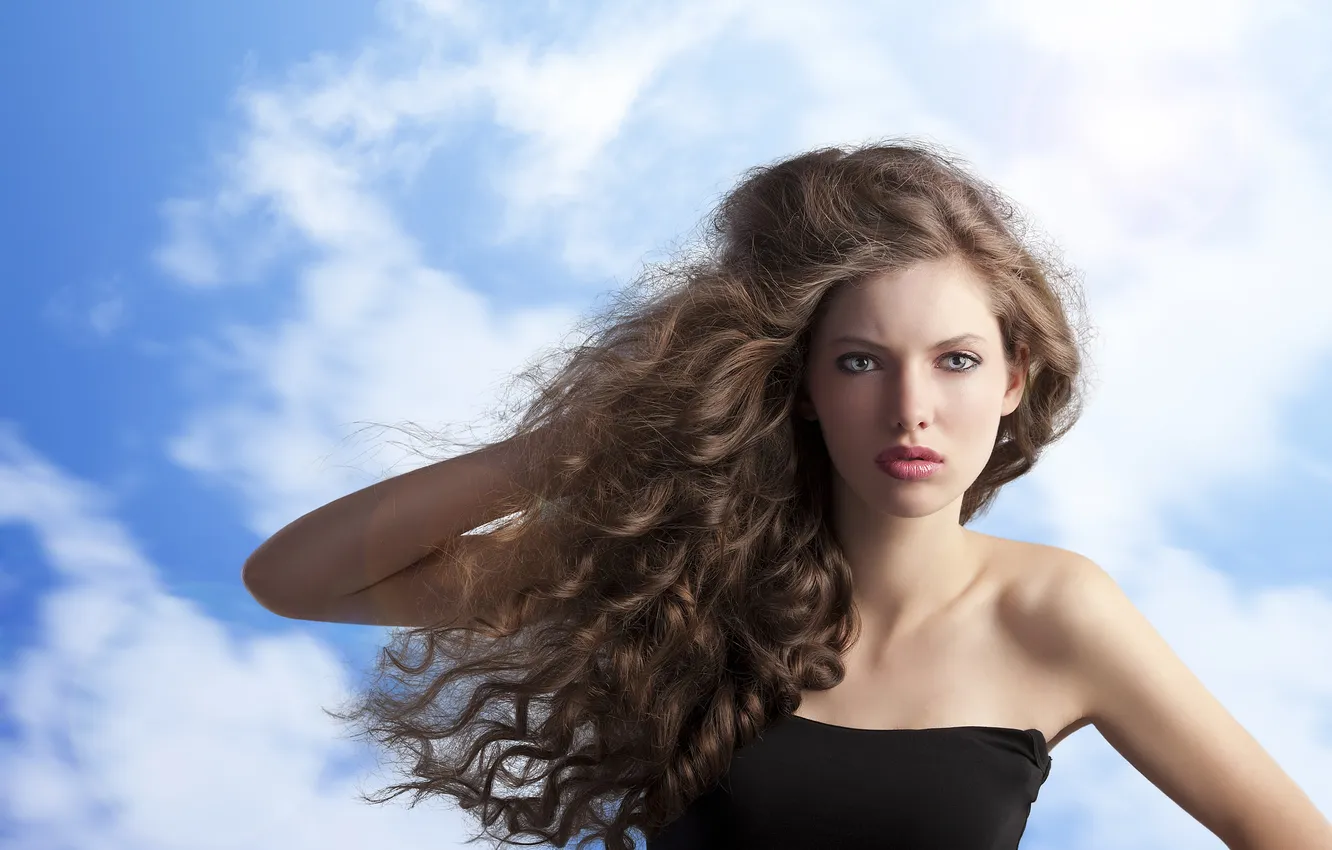Photo wallpaper the sky, girl, the wind, dress, brown hair, shoulders, curls, green-eyed