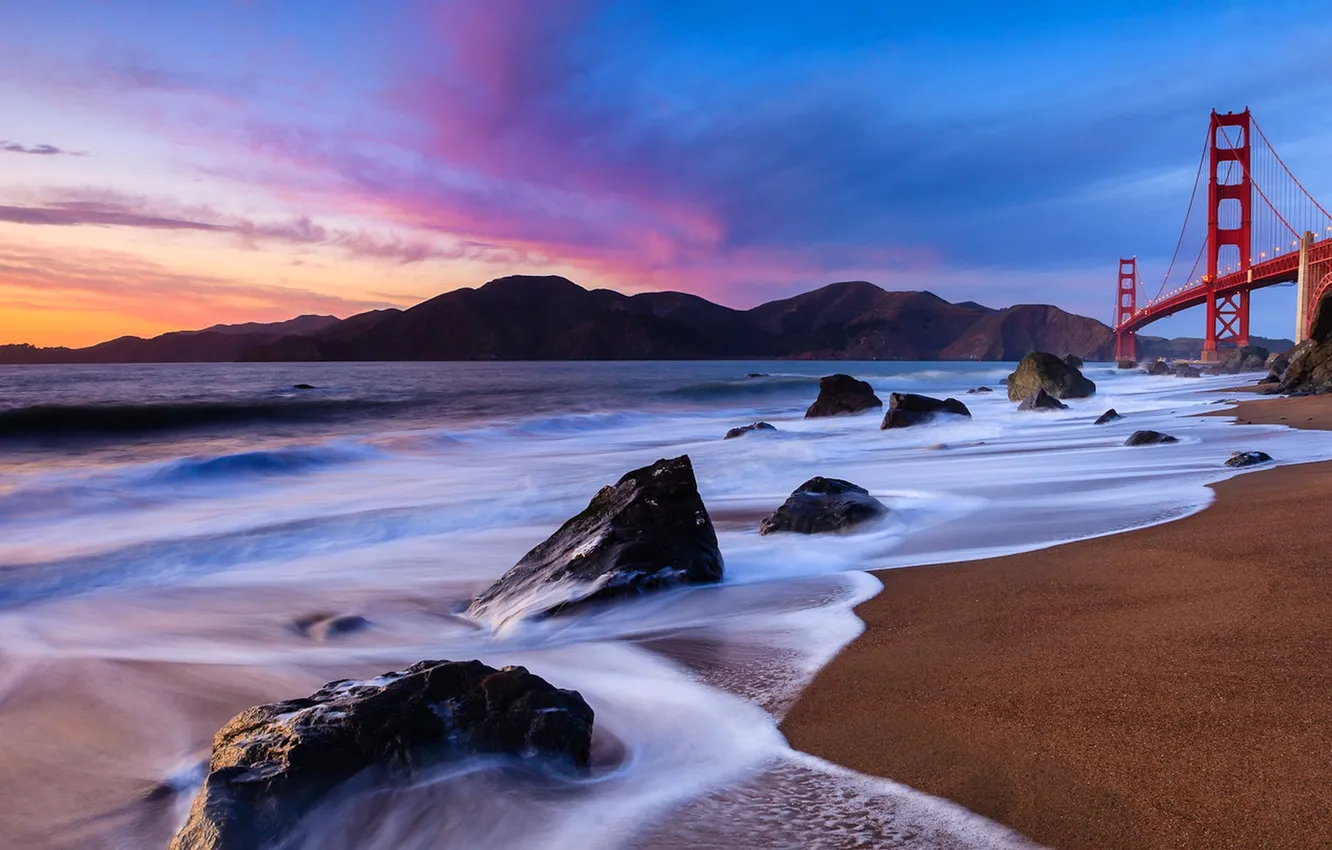 Photo wallpaper sea, the sky, clouds, sunset, mountains, bridge, stones, Bay