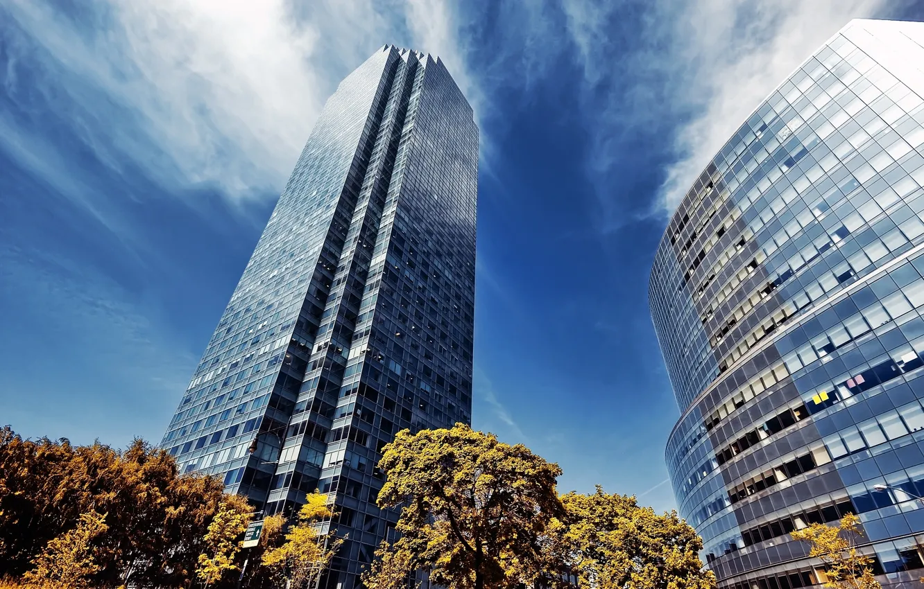 Photo wallpaper the sky, glass, the sun, clouds, light, city, the city, reflection