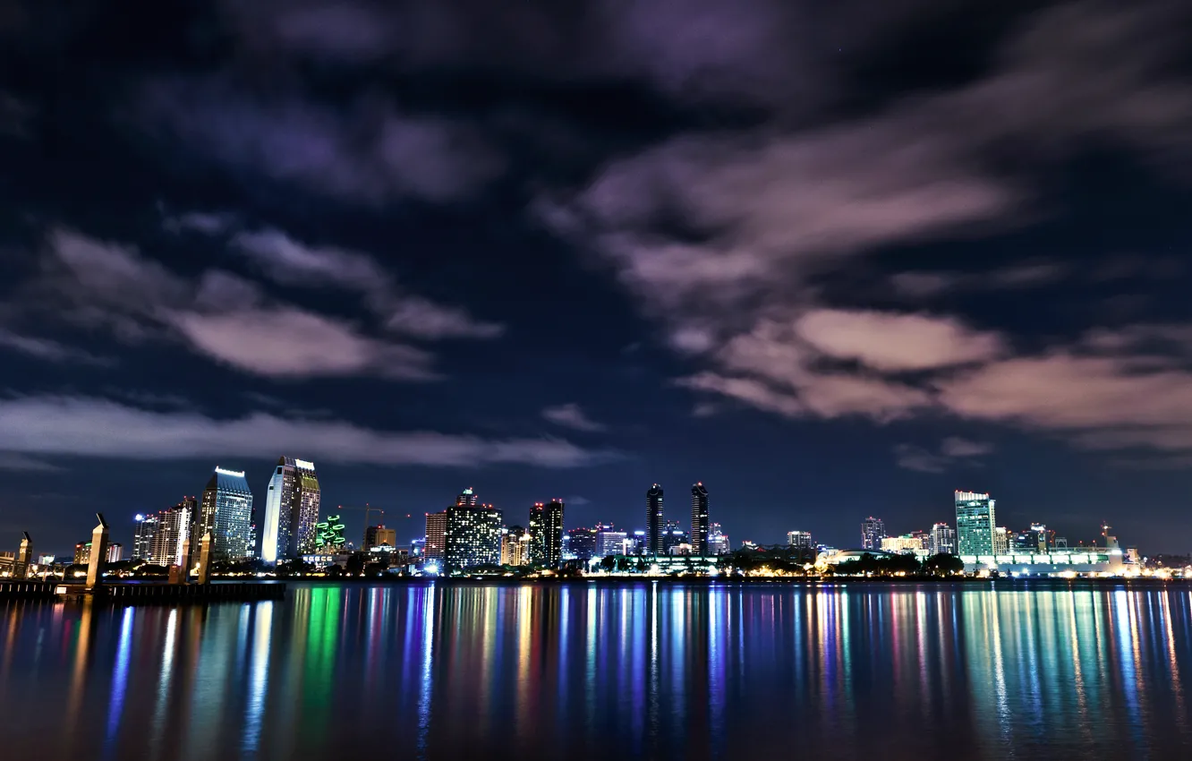 Photo wallpaper the sky, clouds, night, lights, lights, reflection, the ocean, building