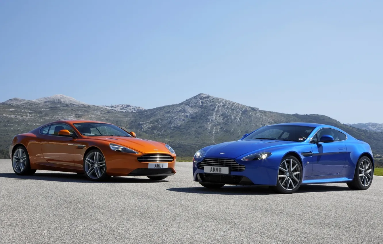 Photo wallpaper the sky, mountains, orange, blue, Aston Martin, Vantage, turn, Aston Martin