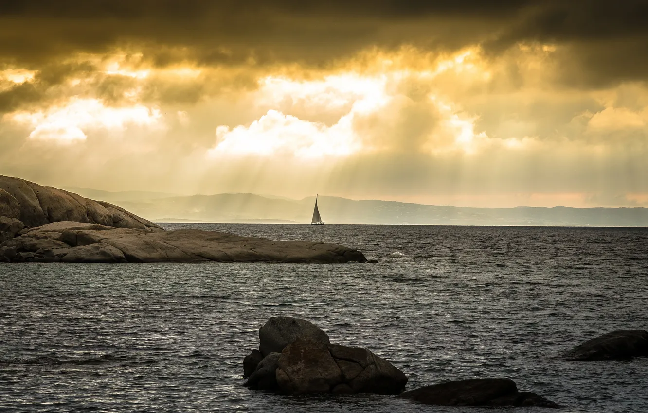 Photo wallpaper sea, rays, mountains, clouds, stones, sailboat