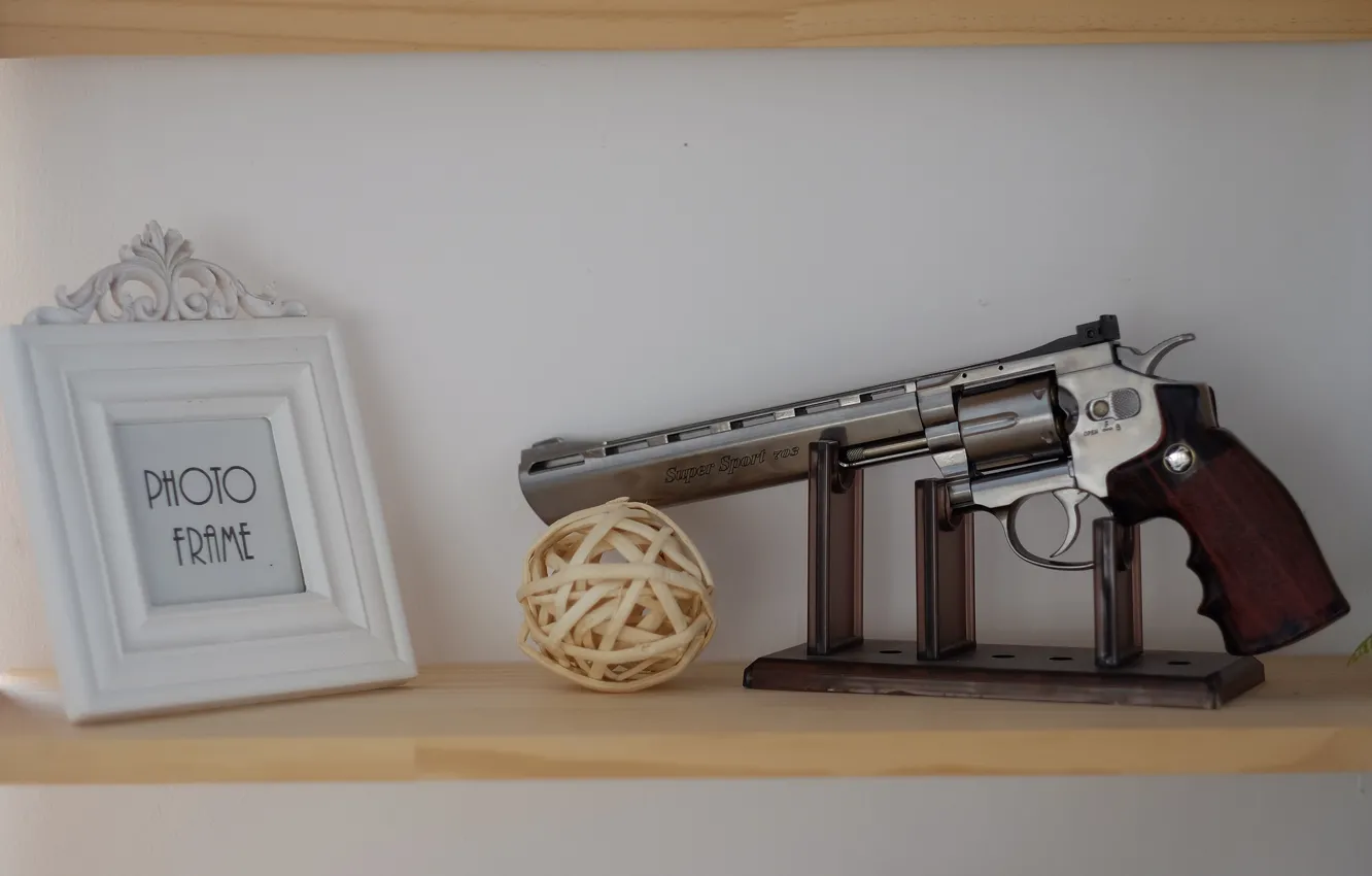 Photo wallpaper trunk, revolver, shelves