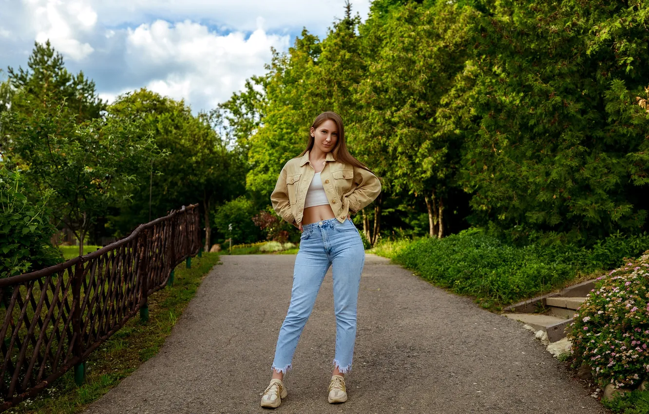 Photo wallpaper girl, road, sky, trees, nature, clouds, model, jeans