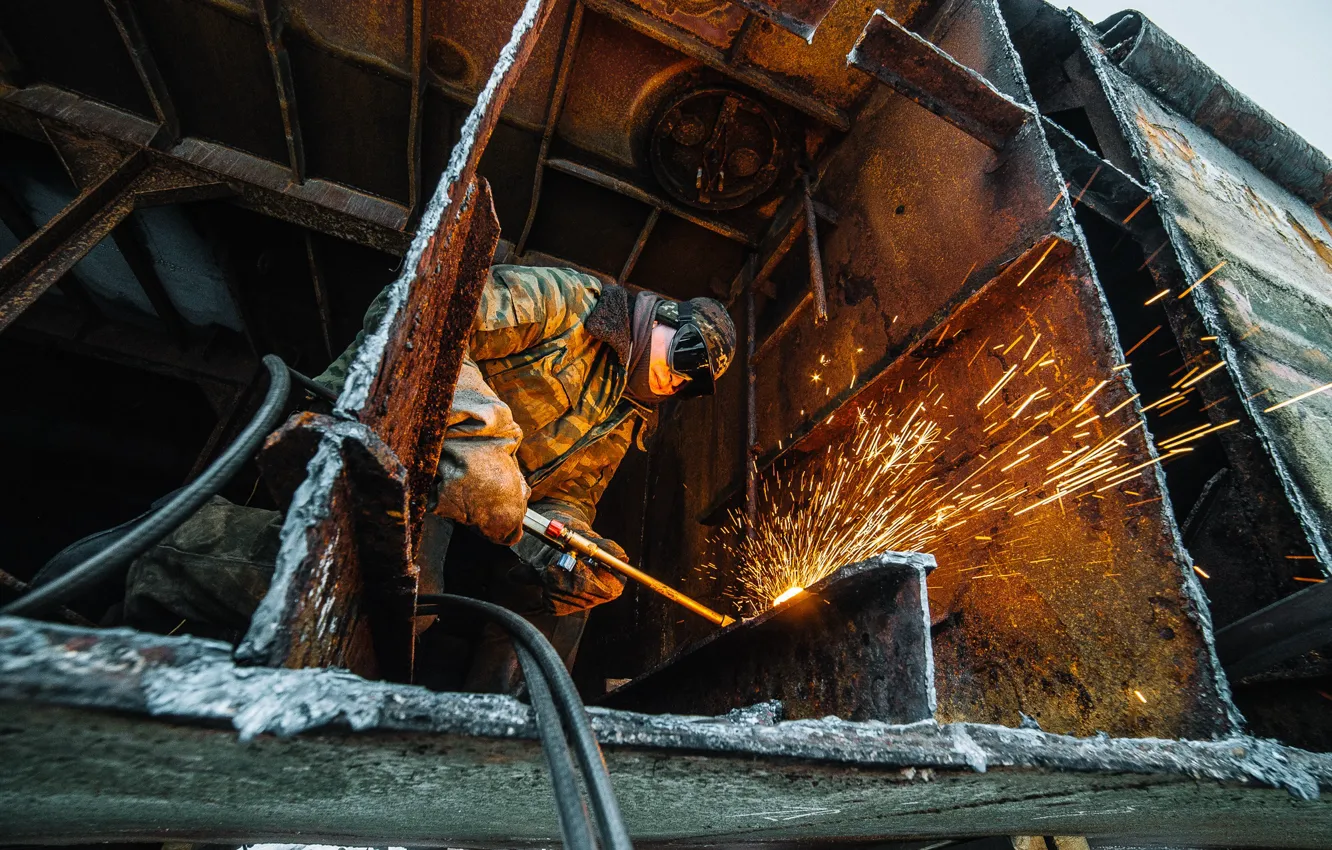 Photo wallpaper cutter, sparks, welder, oxalacetylene