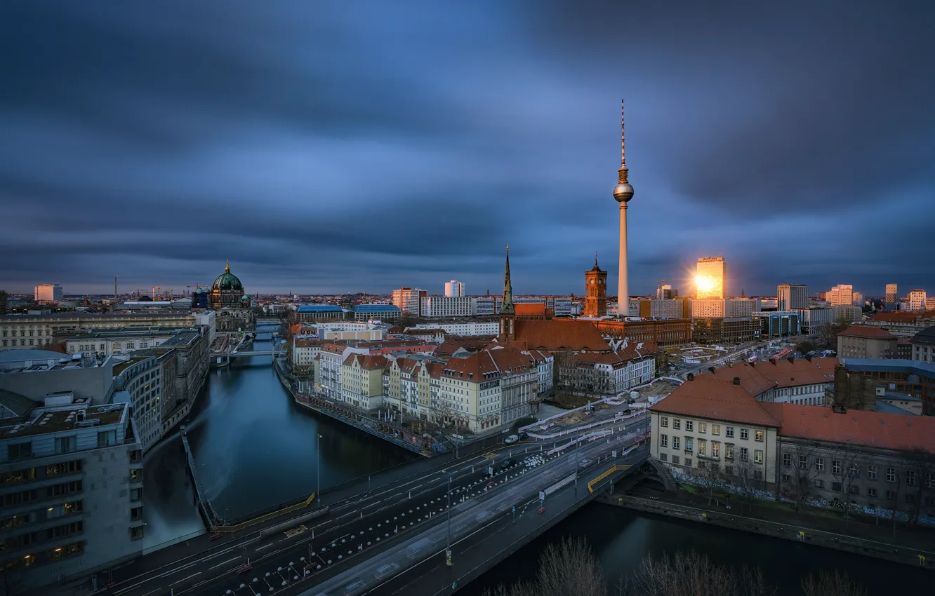Photo wallpaper road, bridge, the city, river, building, tower, home, the evening